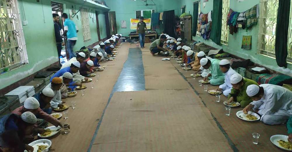 Serve food for Madrasa students